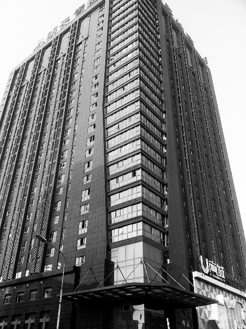 記者按照公開地址在鄭州一處寫字樓尋找一家軟件公司，一無所獲。