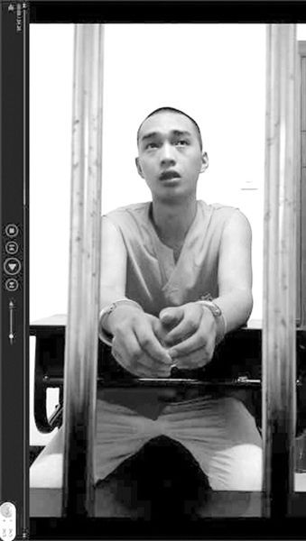 在看守所里的陳明燦。視頻截圖