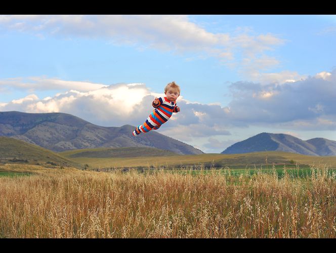 美國男子為患唐氏綜合癥兒子拍“飛行照” 美國男子為患唐氏綜合癥兒子拍“飛行照”