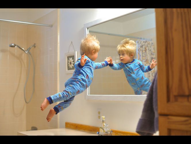 美國男子為患唐氏綜合癥兒子拍“飛行照” 美國男子為患唐氏綜合癥兒子拍“飛行照”