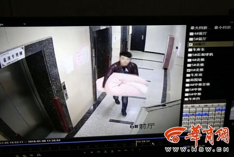 西安一小偷將保險(xiǎn)箱包在被子里離開 過(guò)程僅15分鐘