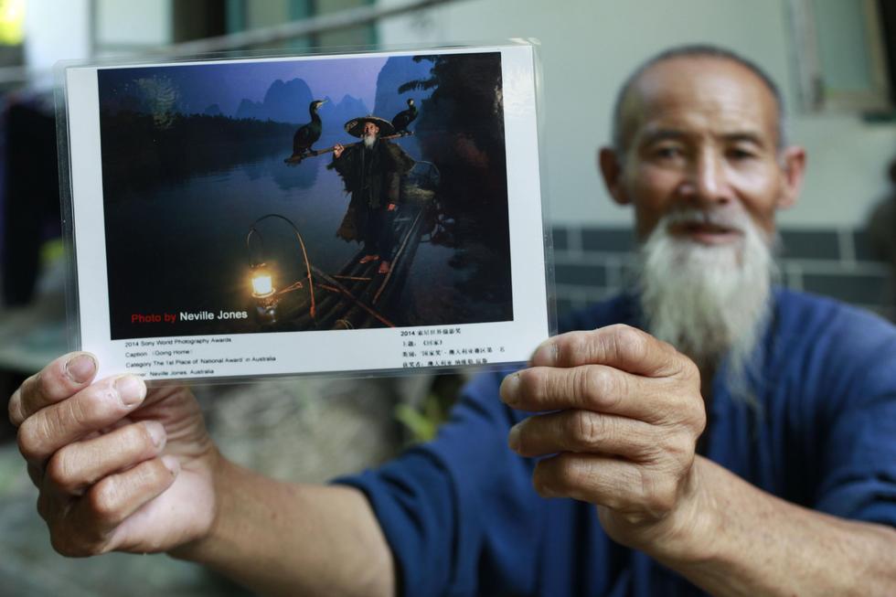 桂林八旬“漁翁兄弟”供人拍照走紅 美奐似大片 桂林八旬“漁翁兄弟”供人拍照走紅 美奐似大片